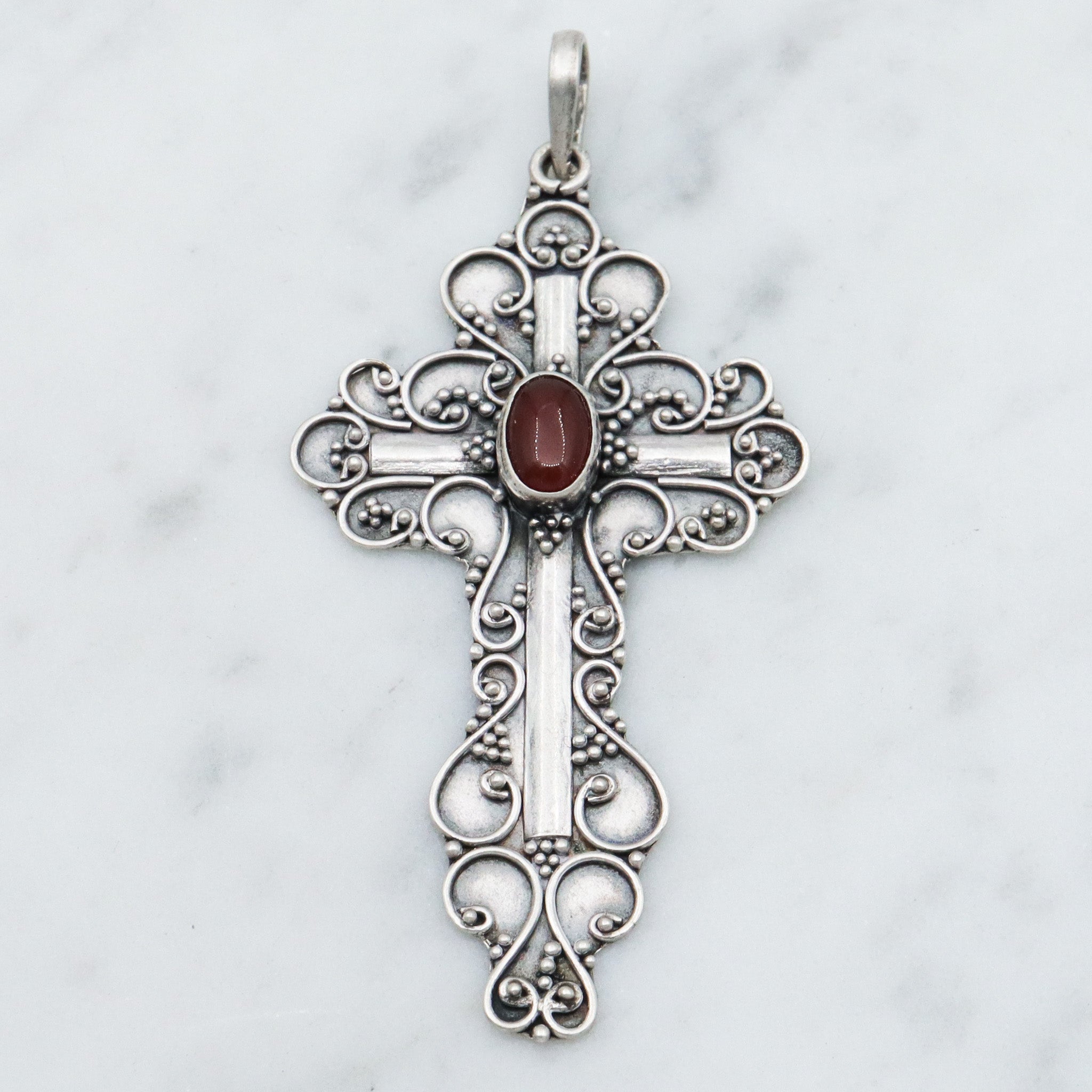Vintage sterling silver & carnelian fancy scroll cross pendant